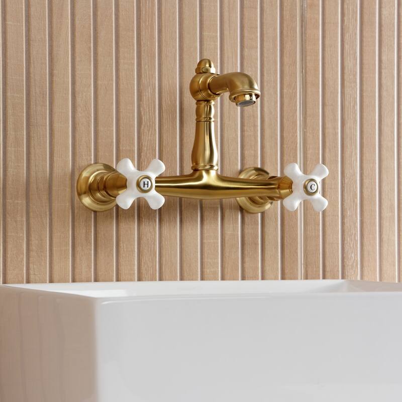 Kingston Brass English Country Two-Handle 2-Hole Wall Mount Bathroom Faucet