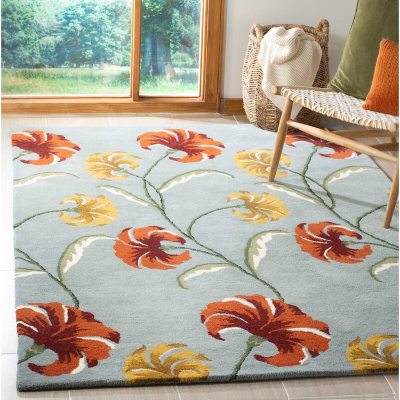 SAFAVIEH Handmade Soho Emilee Botanical N.Z. Wool Rug - 7'6" x 9'6" - Blue/Multi