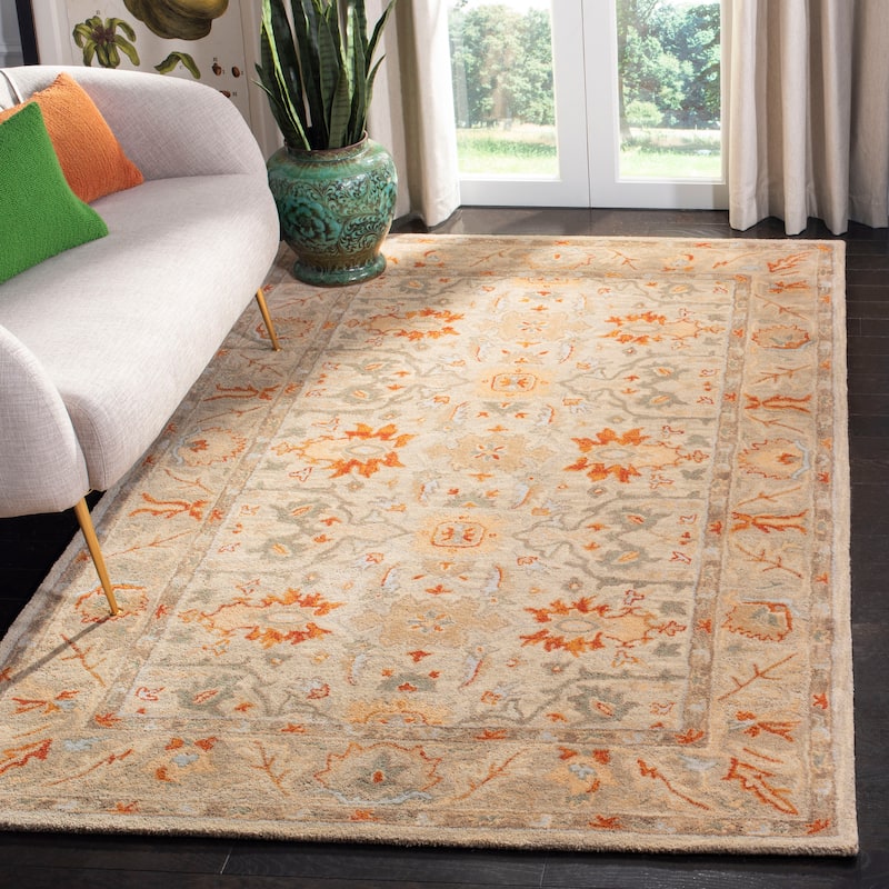 SAFAVIEH Handmade Antiquity Fenella Traditional Oriental Wool Rug - 5' x 8' - Beige/Multi