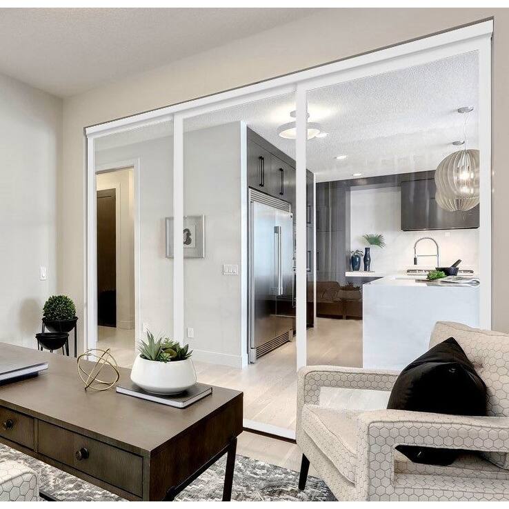THE SLIDING DOOR COMPANY 3 Panel, Sliding Room Divider, Clear Glass and Aluminum Frame on triple track.