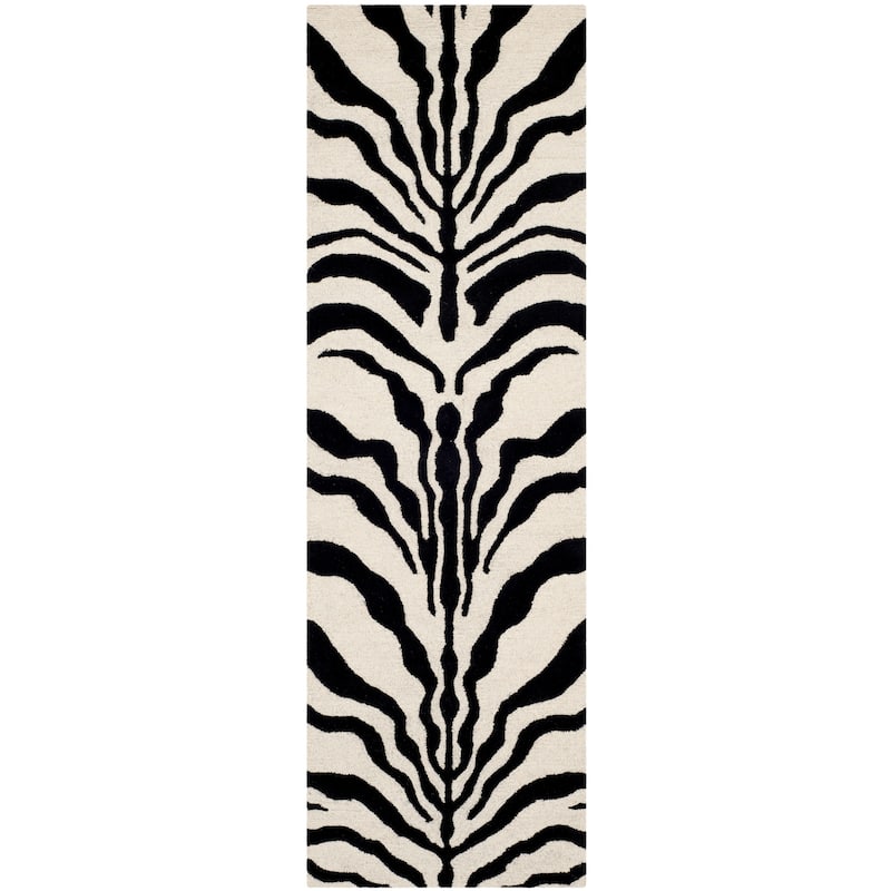 SAFAVIEH Handmade Cambridge Rikey Animal Print Wool Rug - 2'6" x 8' Runner - Ivory/Black