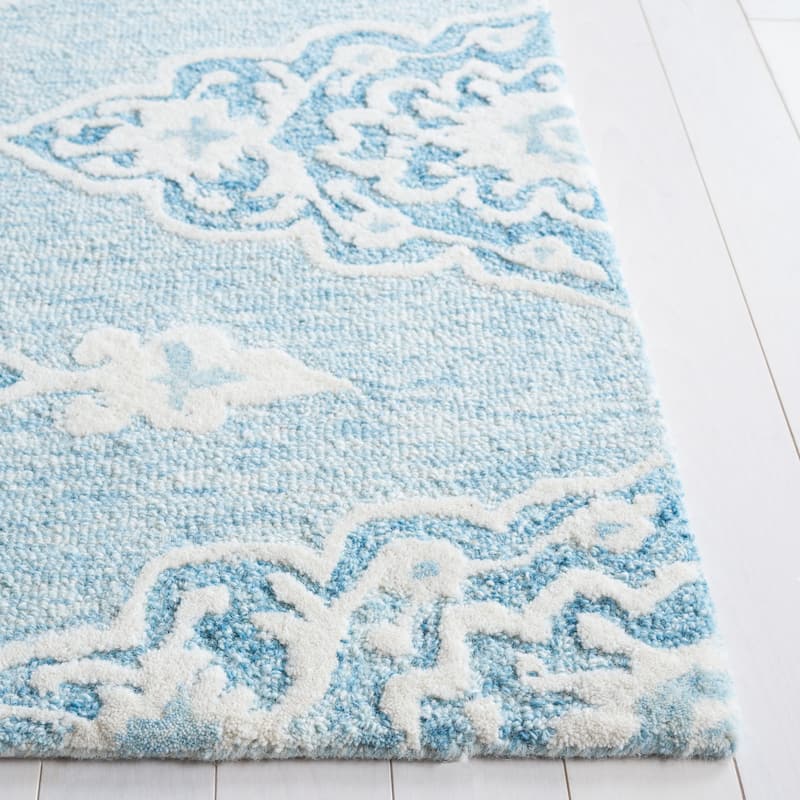 SAFAVIEH Handmade Ebony Ysaline Modern Wool Rug