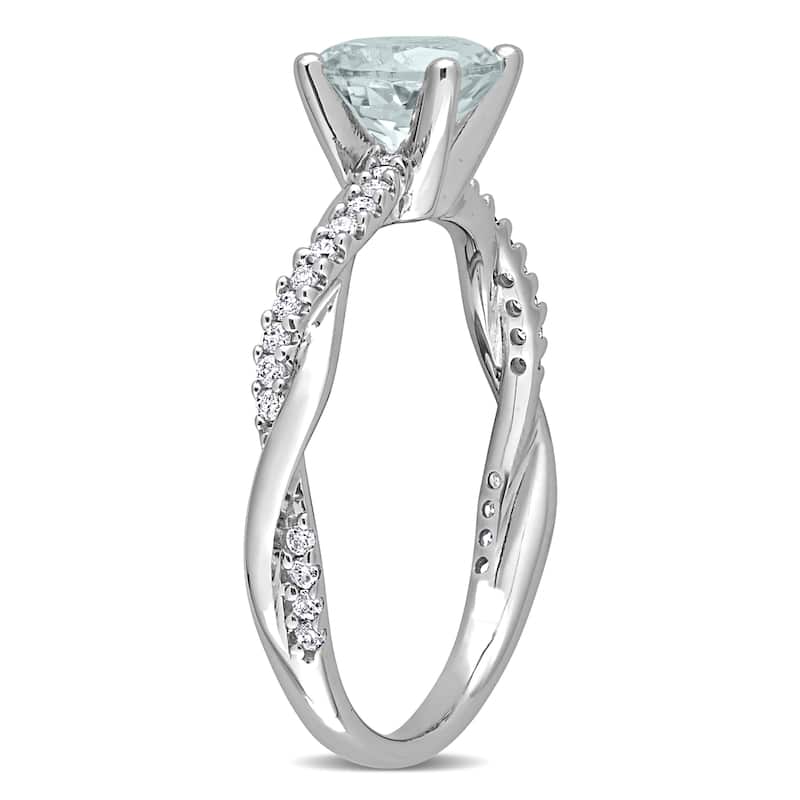 Miadora Aquamarine and 1/6ct TDW Diamond Crossover Birthstone Ring in 14k White Gold