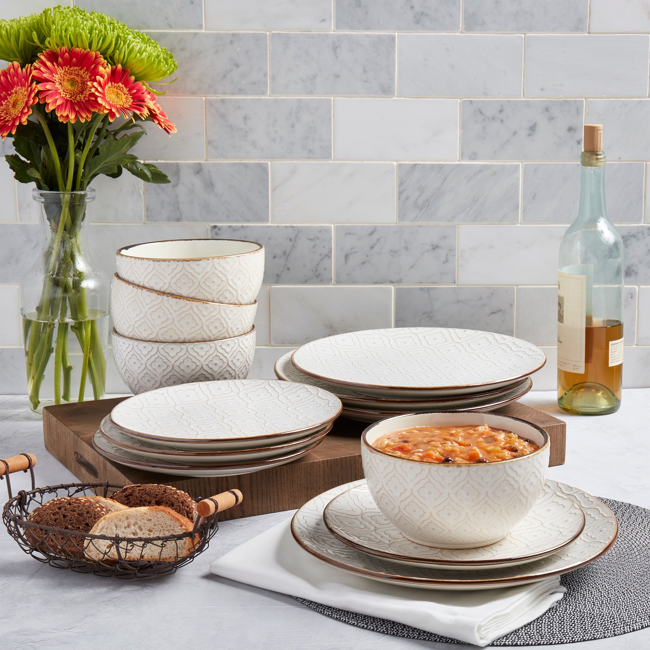 https://ak1.ostkcdn.com/images/products/is/images/direct/25afb4b64a9bbdad5b31d2ffbef447d383bd8a3c/Tabletops-Gallery-Sandra-12PC-Embossed-Ivory-Round-Dinnerware-Set.jpg
