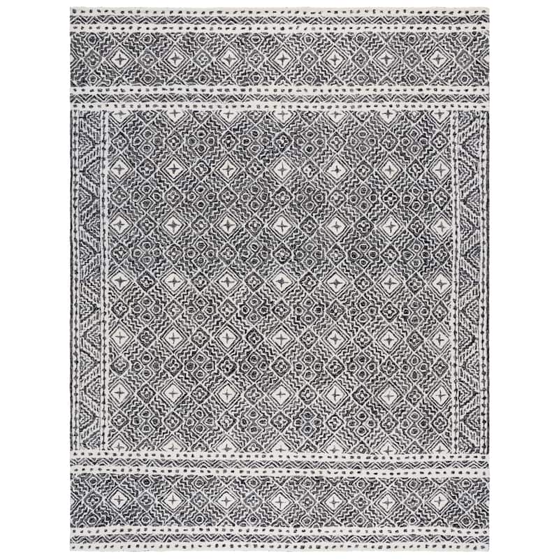 SAFAVIEH Handmade Micro-Loop Jelske Wool Rug