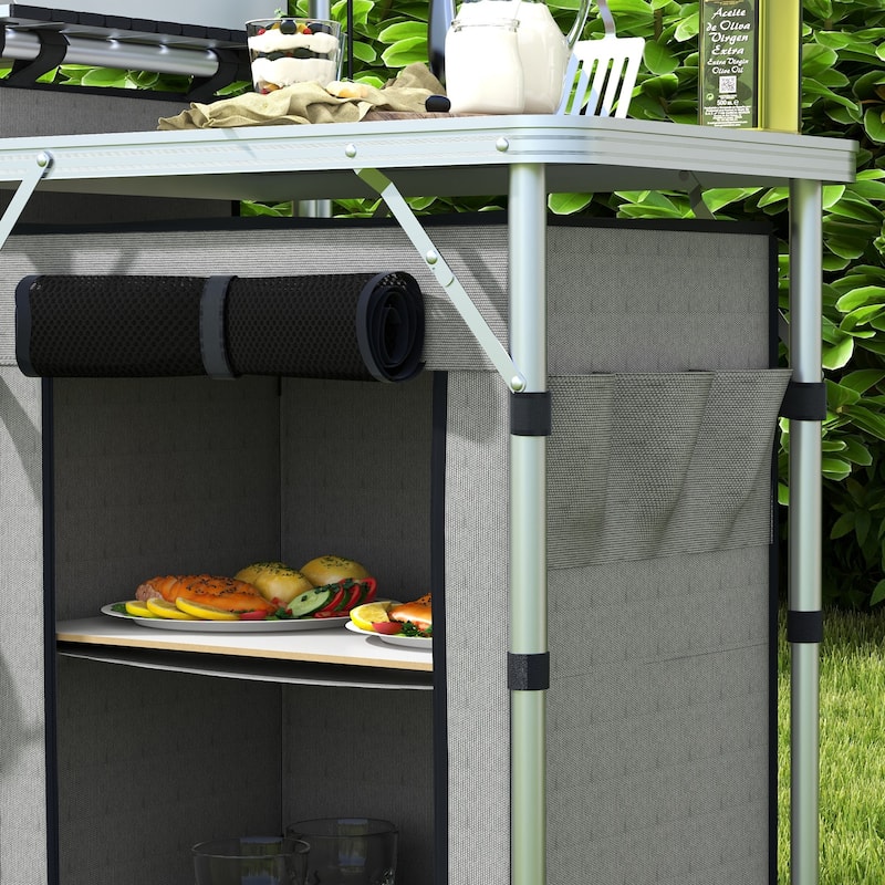 Outsunny Camping Kitchen Table, Portable Folding Camp Kitchen, Aluminum Cook Station with 3 Fabric Cupboards, Windshield