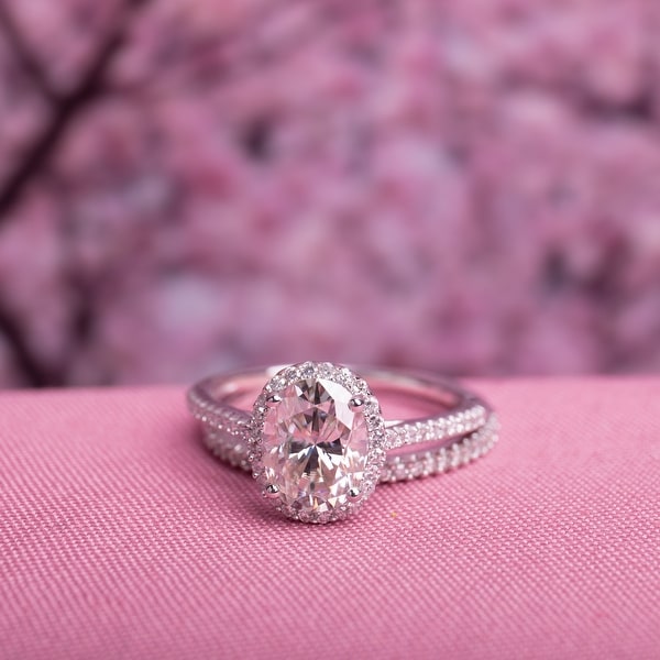 Oval 2ct TGW Moissanite and 1/3ct TDW Diamond Bridal Set in 14k White Gold by Miadora. Opens flyout.