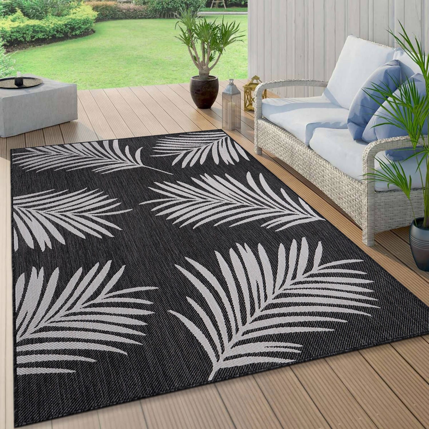 https://ak1.ostkcdn.com/images/products/is/images/direct/2660b623ec25ea0e461f0e2826764fca176ac0a5/World-Rug-Gallery-Contemporary-Palm-Leaves-Textured-Flat-Weave-Indoor-Outdoor-Area-Rug.jpg