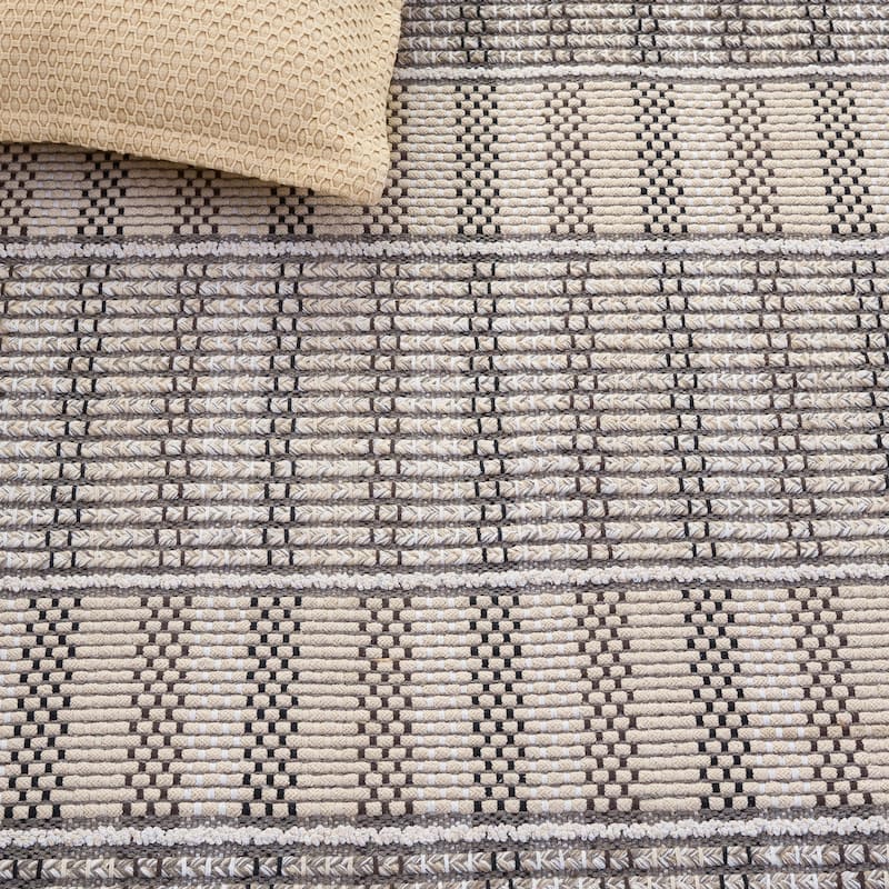 SAFAVIEH Handmade Braided Ladan Cotton Rug