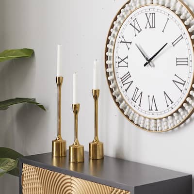CosmoLiving by Cosmopolitan Gold or Silver Aluminum Metal Decorative Candle Holder (Set of 3)