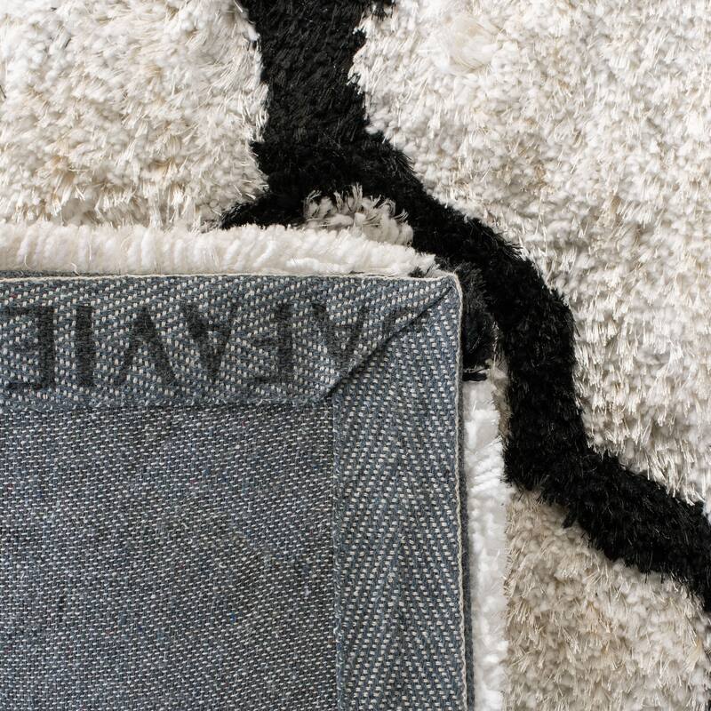 SAFAVIEH Handmade Barcelona Shag Kiyo Polyester Rug