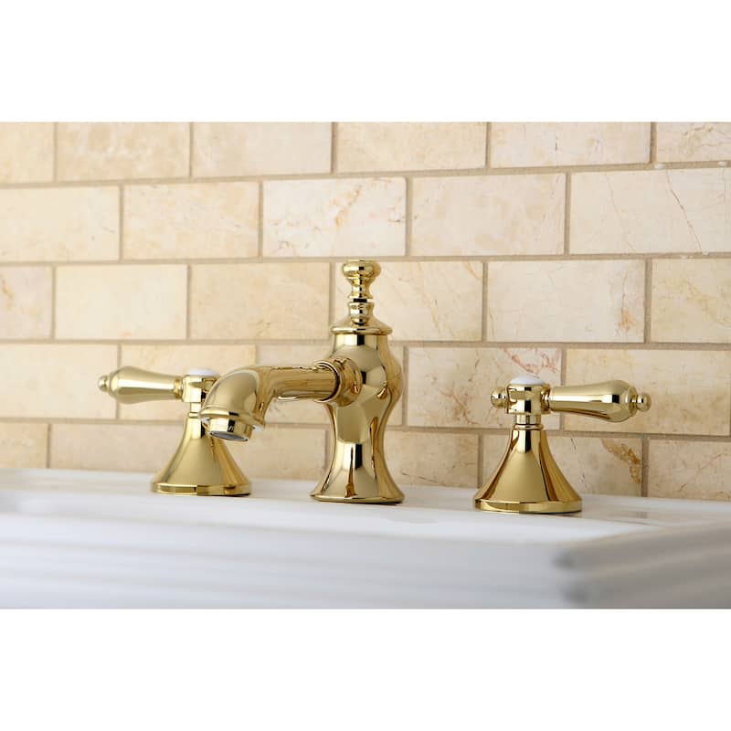 Kingston Brass Heirloom Deck Mount Widespread Bathroom Faucet with Brass Pop-Up