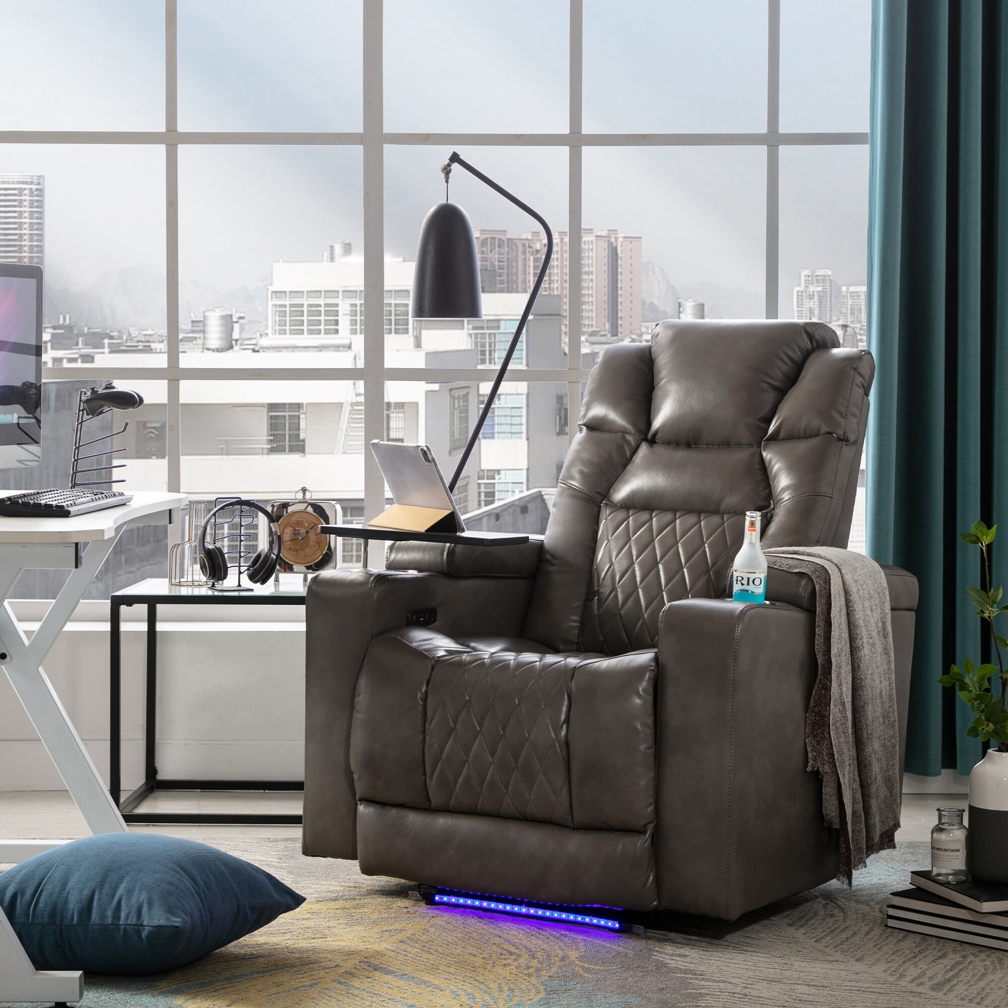 Swivel tray table for outlet recliner