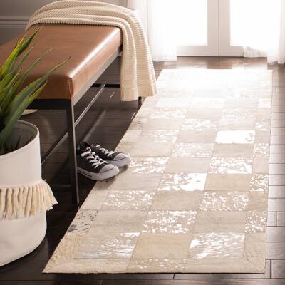 SAFAVIEH Handmade Studio Leather Imma Modern Leather Rug