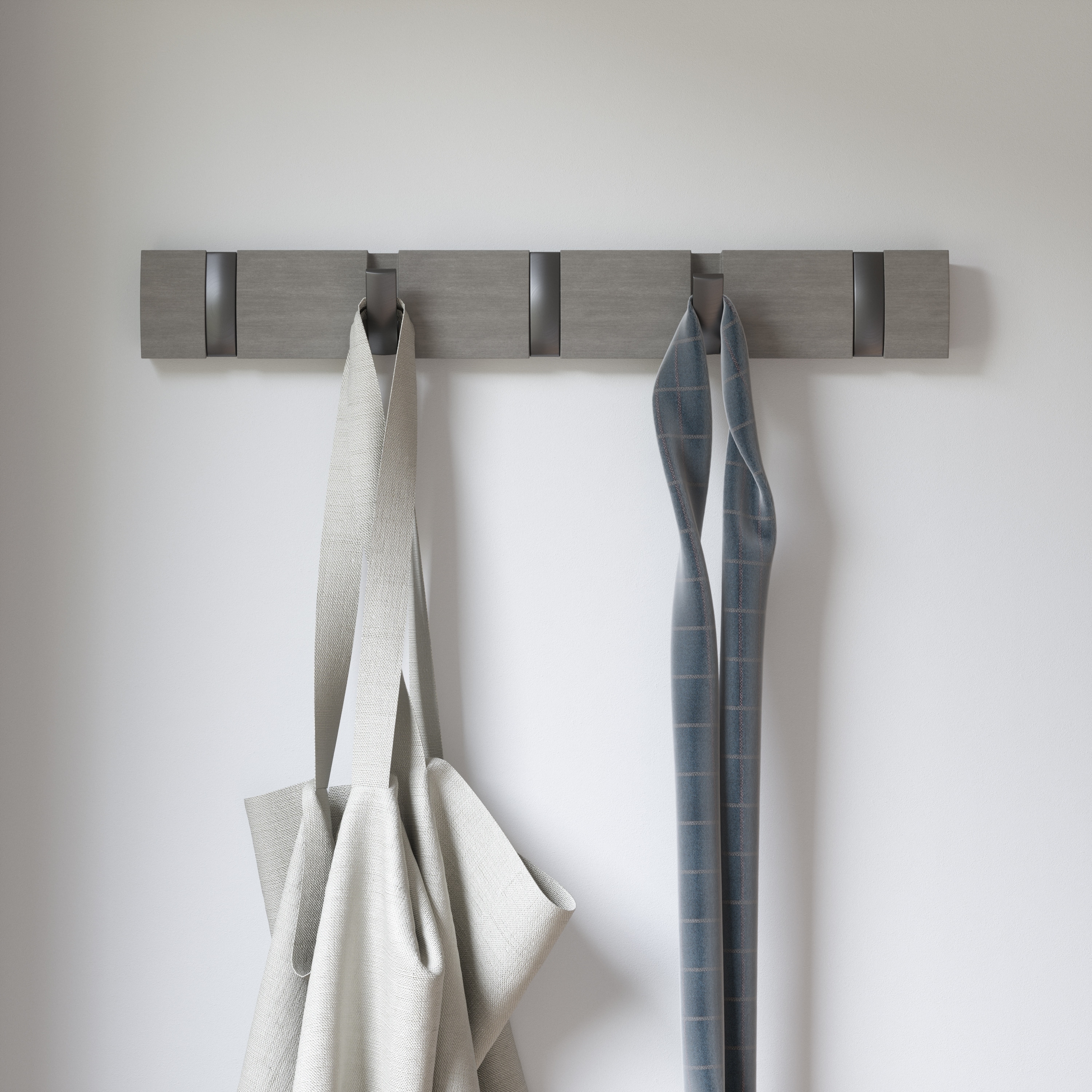 https://ak1.ostkcdn.com/images/products/is/images/direct/26fae4ee76607a4afcfc43d0d547a9fb52292d71/Umbra-Flip-Wall-Mounted-Coat-Rack.jpg