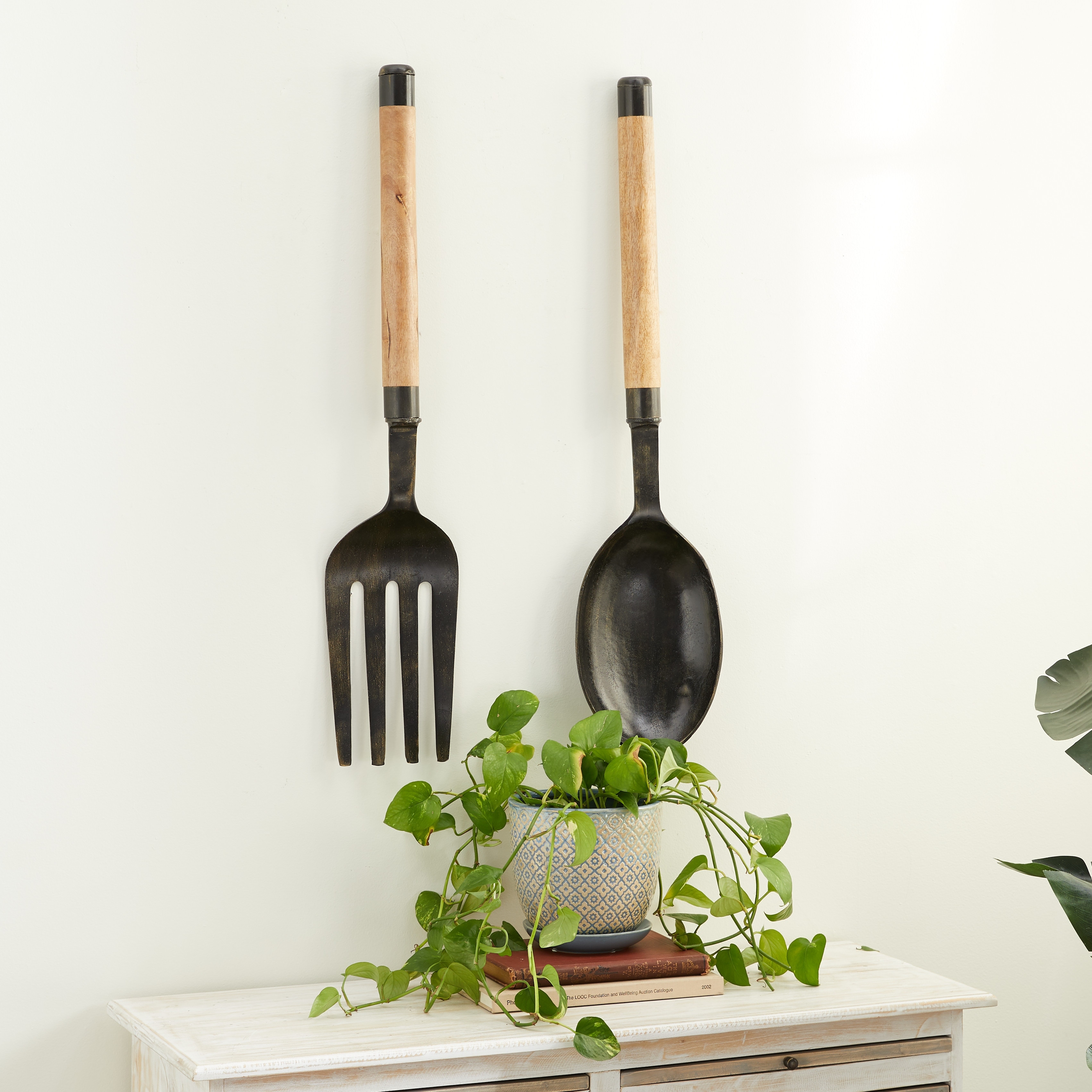 Large fork and store spoon wall decor
