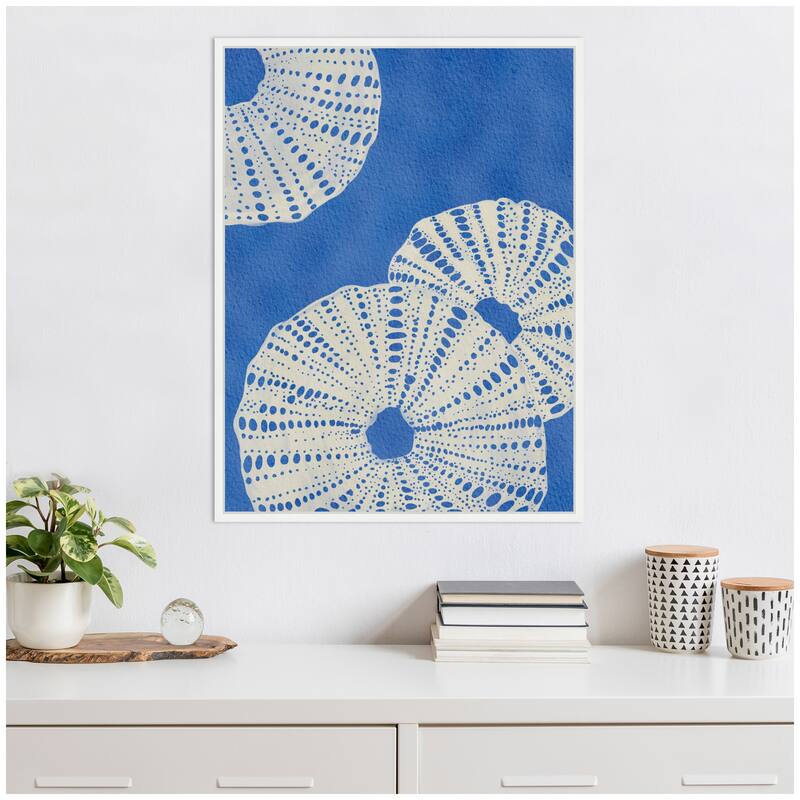 Kate and Laurel Sylvie Ocean charms ll Framed Canvas by Nikita Jariwala
