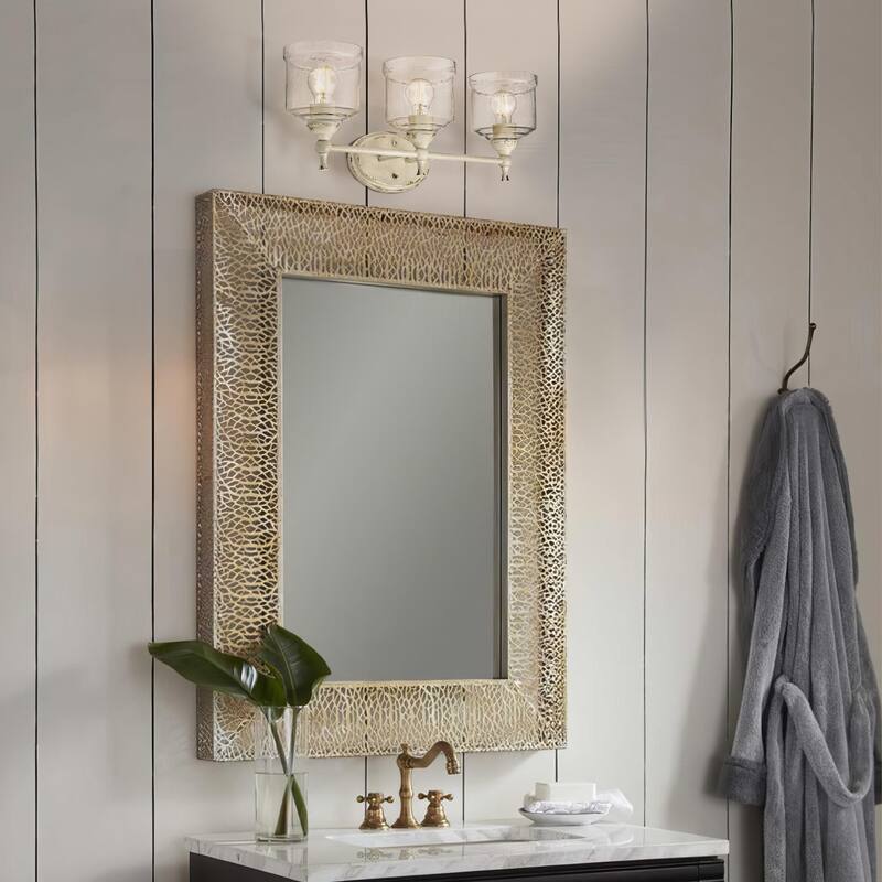 Keating 3 Light Bath Vanity in Antique Ivory with Hammered Water Glass Shade - White