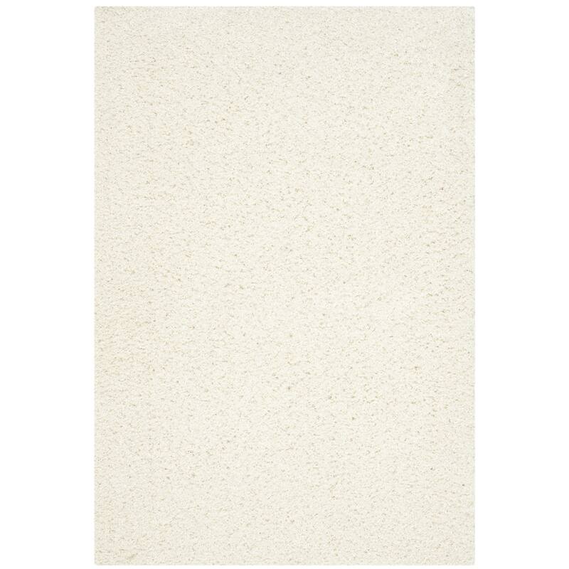 SAFAVIEH Handmade Sheep Shag Kalie Solid Polyester Rug - 5' x 8' - Ivory