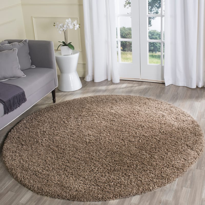 SAFAVIEH Laguna Shag Verdiana Solid Color 2-inch Thick Rug.
