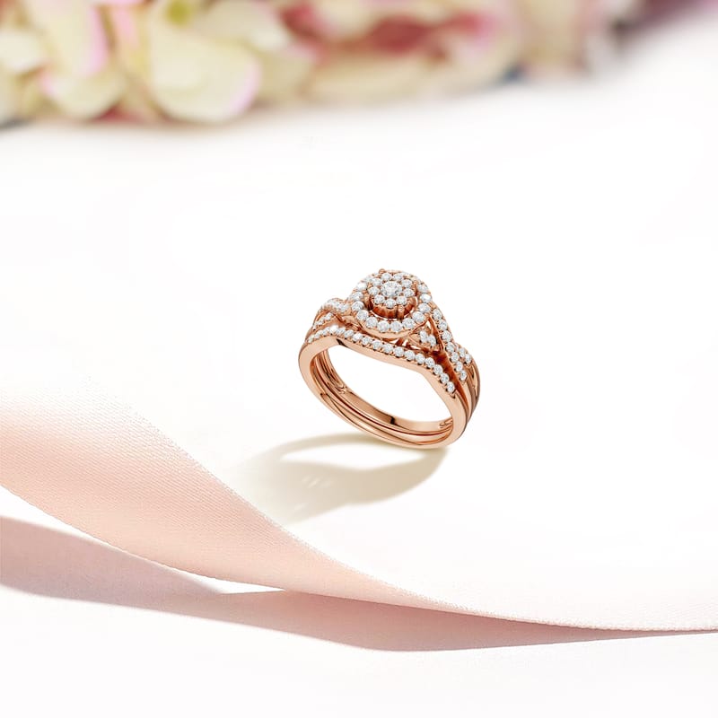 3/8Ct TDW Diamond Halo Twist Shank Bridal Set in 10K Gold for Women