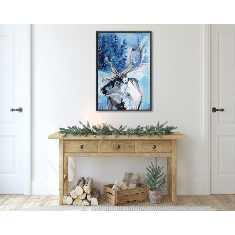 Kate and Laurel Sylvie Reindeer In Snow Framed Canvas by Rachel Christopoulos