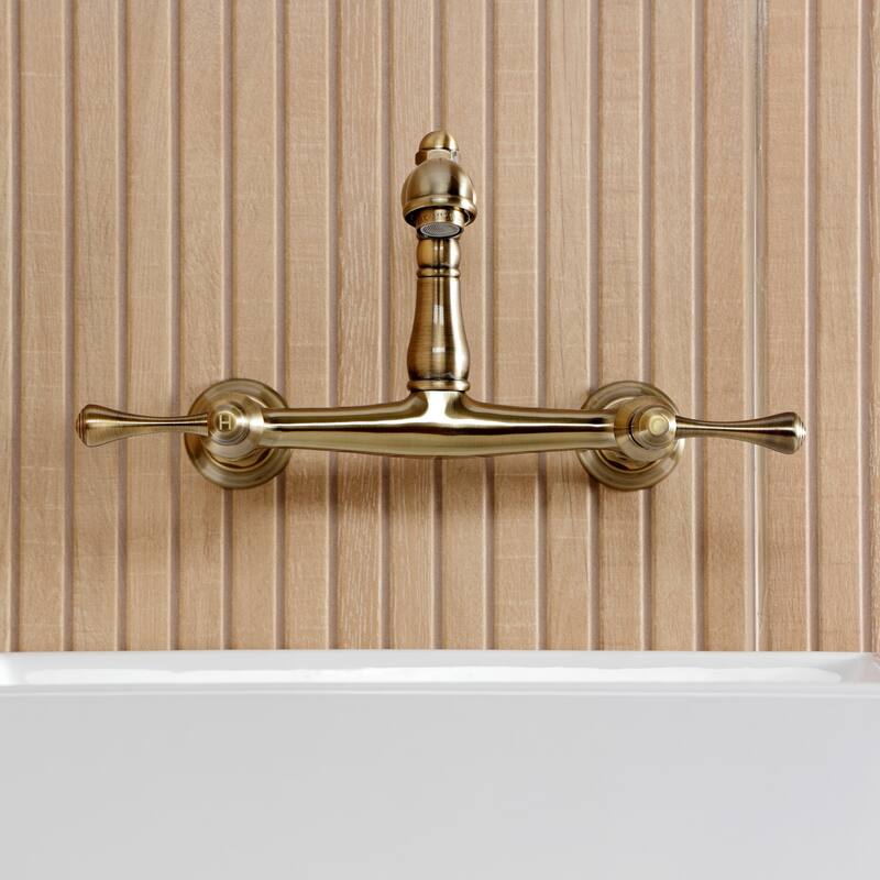 Kingston Brass English Country Two-Handle 2-Hole Wall Mount Bathroom Faucet