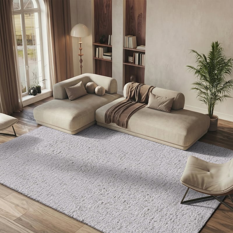 SAFAVIEH Handmade Florence Shag Isamar Solid Polyester Rug