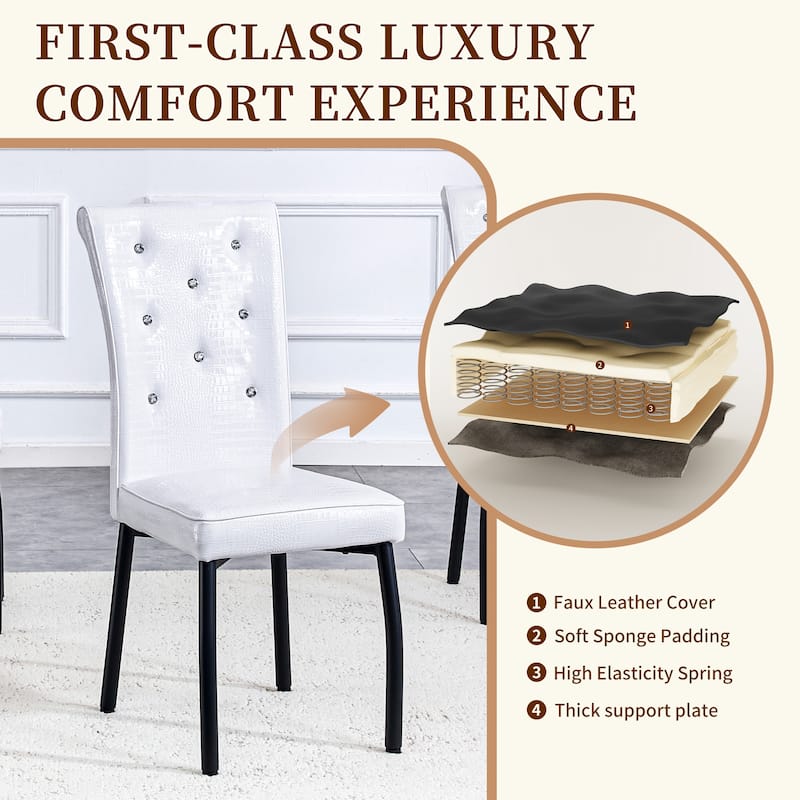 A set of 4 white and black vintage crocodile leather cushioned dining chairs, featuring crystal clasp design and leather