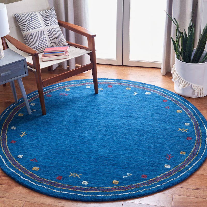 SAFAVIEH Handmade Himalaya Breann Border Wool Rug