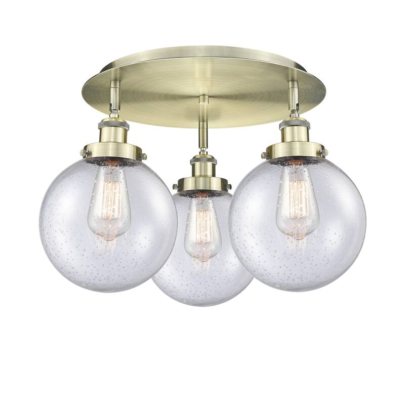 Innovations Lighting Canton - 3 Light 20" Flush Mount - Antique Brass/Seedy