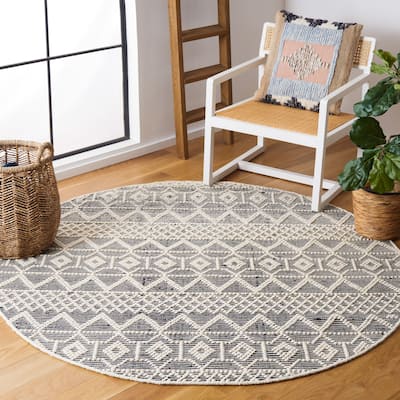 SAFAVIEH Handmade Natura Fehrat Wool Braided Tassel Rug