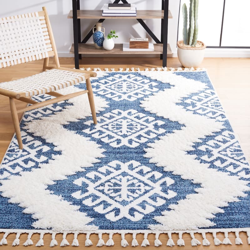 SAFAVIEH Moroccan Tassel Shag Berneice Boho Tribal 2-inch Thick - 5' 3" x 7' 6" - Blue/Ivory