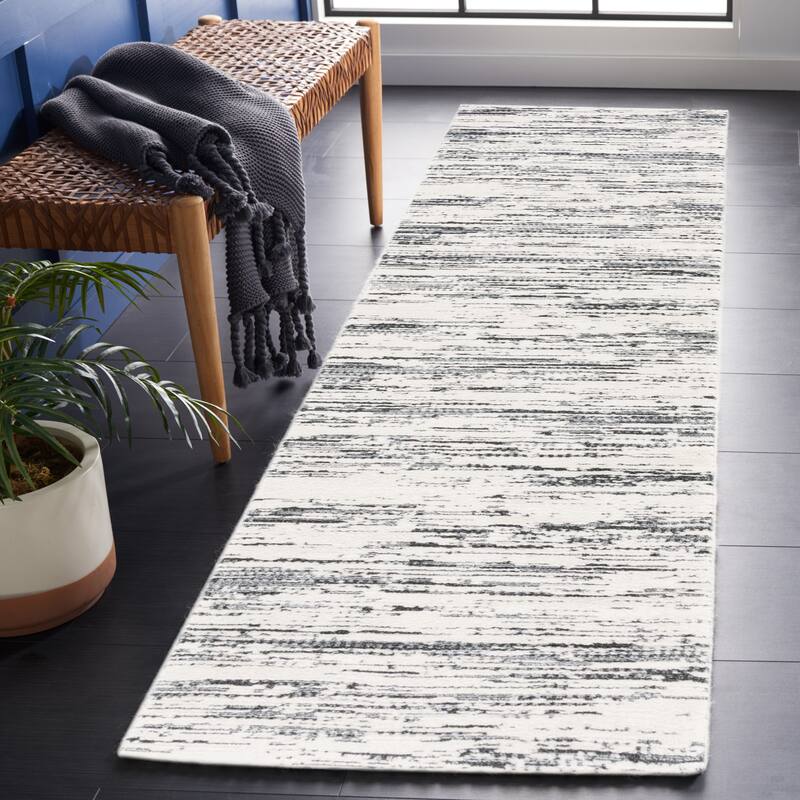 SAFAVIEH Alamo Merita Distressed Rug