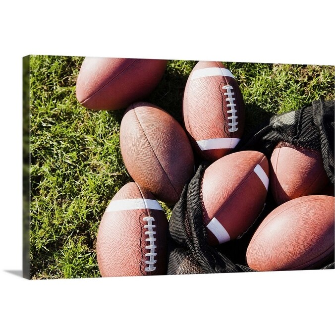 Shop Close Up Of Footballs On A Field Canvas Wall Art Free