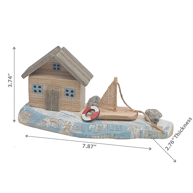 Wooden House & Sail Boat By The Sea Shore