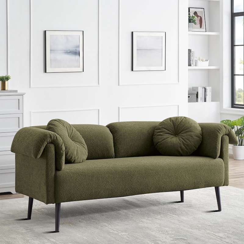 Modern minimalist sofa with pillows and pillowed armrests, metal legs