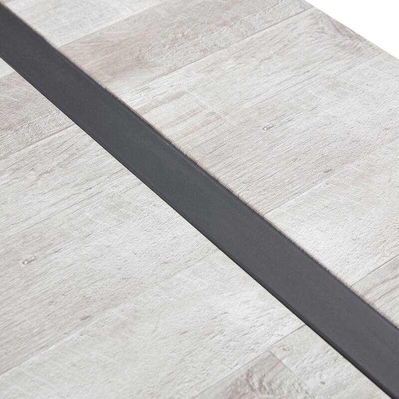 A minimalist retro rectangular dining table with a specially textured top and black metal legs.Contemporary Minimalist M