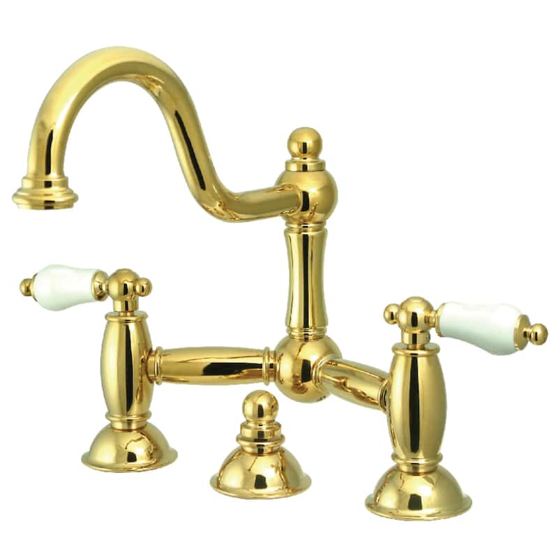 Kingston Brass Restoration Bridge Bathroom Faucet with Pop-Up Drain