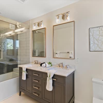 Haven 16 in. 2-Light Old Satin Brass Vanity Light with Clear Rippled Glass Shades for Bathrooms