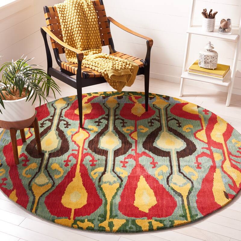 SAFAVIEH Handmade Ikat Meliha Modern Wool Rug - 6' Round - Blue/Green