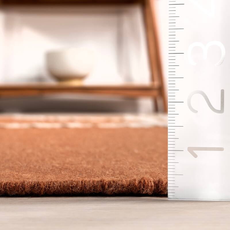 SoHo Tasseled Wool Area Rug