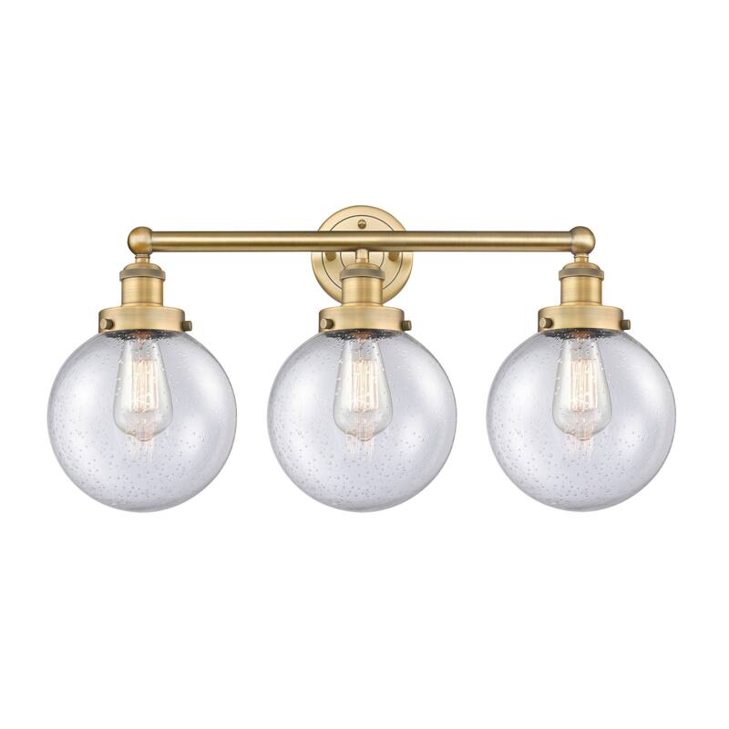 Innovations Lighting 616-3W-10-25 Beacon Vanity Beacon 3 Light 25" - Brushed Brass / Seedy