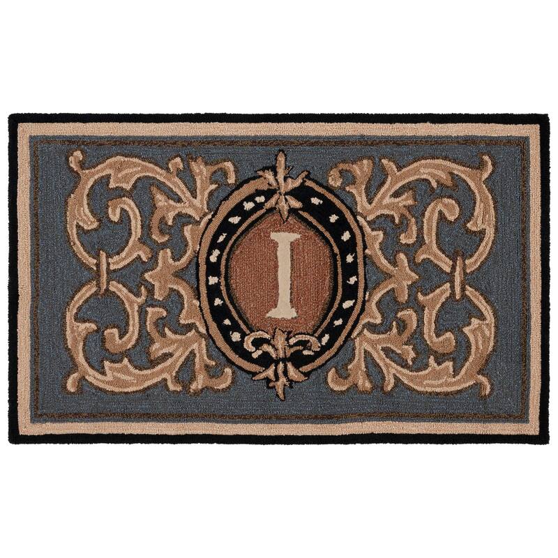 SAFAVIEH Handmade Monogram Irmengard Casual Rug