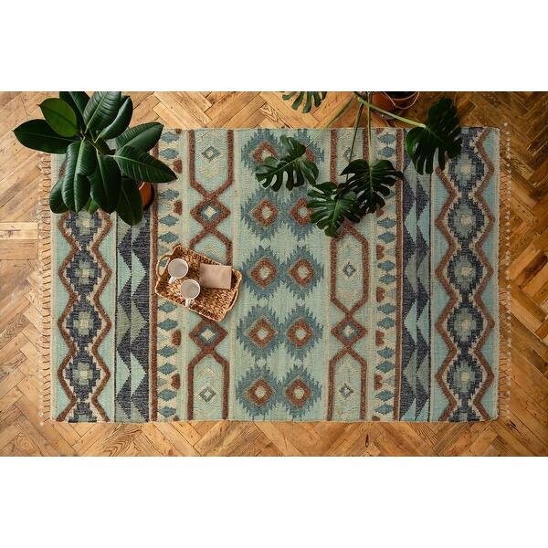 Alejandra Mint Handloomed Jute and Wool Blend Area Rug On Sale Bed