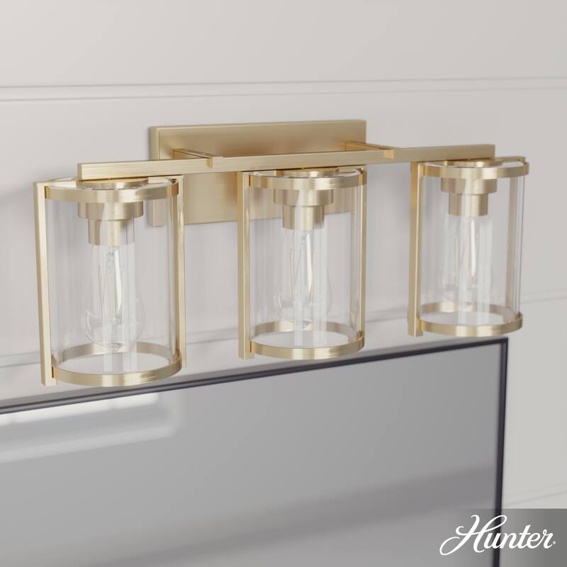 Hunter Astwood Bathroom Vanity Light, Clear Cylinder Glass, Damp Rated, Caged - Contemporary, Transitional, Art-Deco - 3-Light 24" - Alturas Gold
