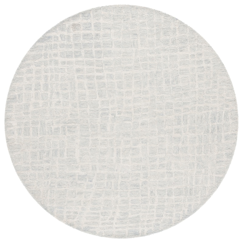 SAFAVIEH Handmade Ebony Gonneke Modern & Contemporary Wool Rug - 6' Round - Ivory/Light Blue