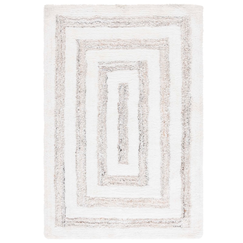 SAFAVIEH Handmade Glory Linett Shag 1.2-inch Thick Rug - 6' x 9' - Ivory/Beige
