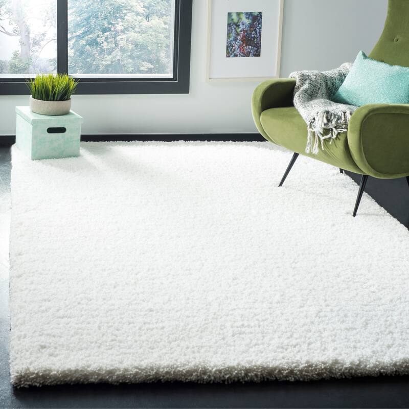 SAFAVIEH Handmade Ultimate Shag Martika Solid Polyester Rug - 4' x 6' - Ivory