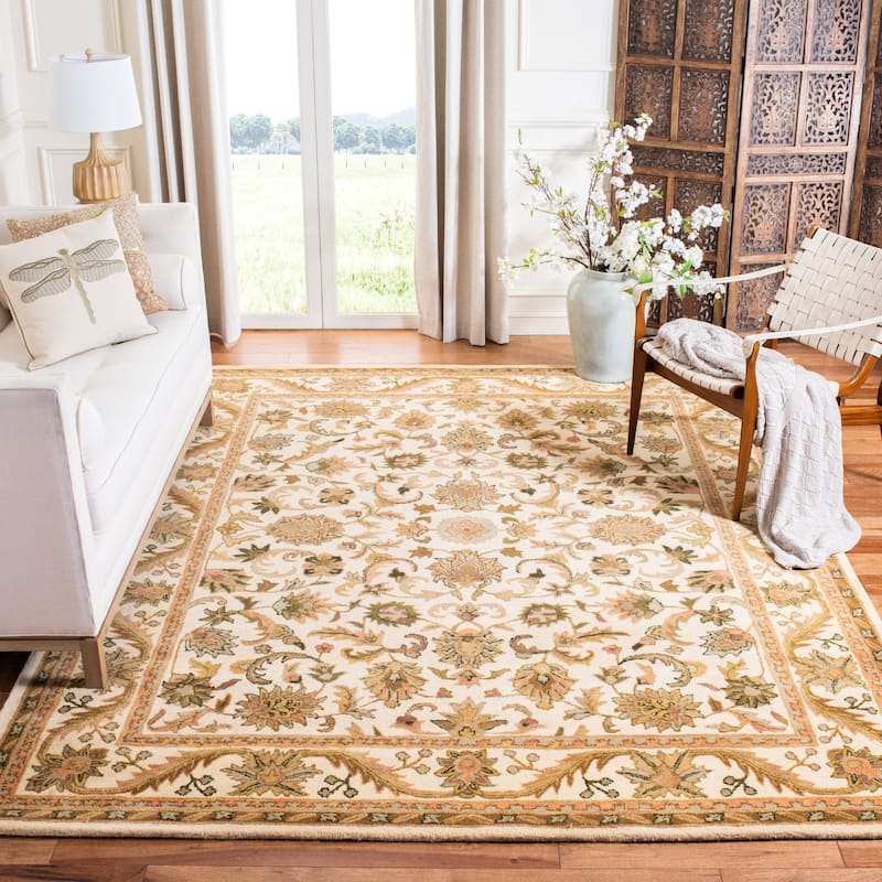 SAFAVIEH Handmade Antiquity Manerva Traditional Oriental Wool Rug - 9'6" x 13'6" - Gold